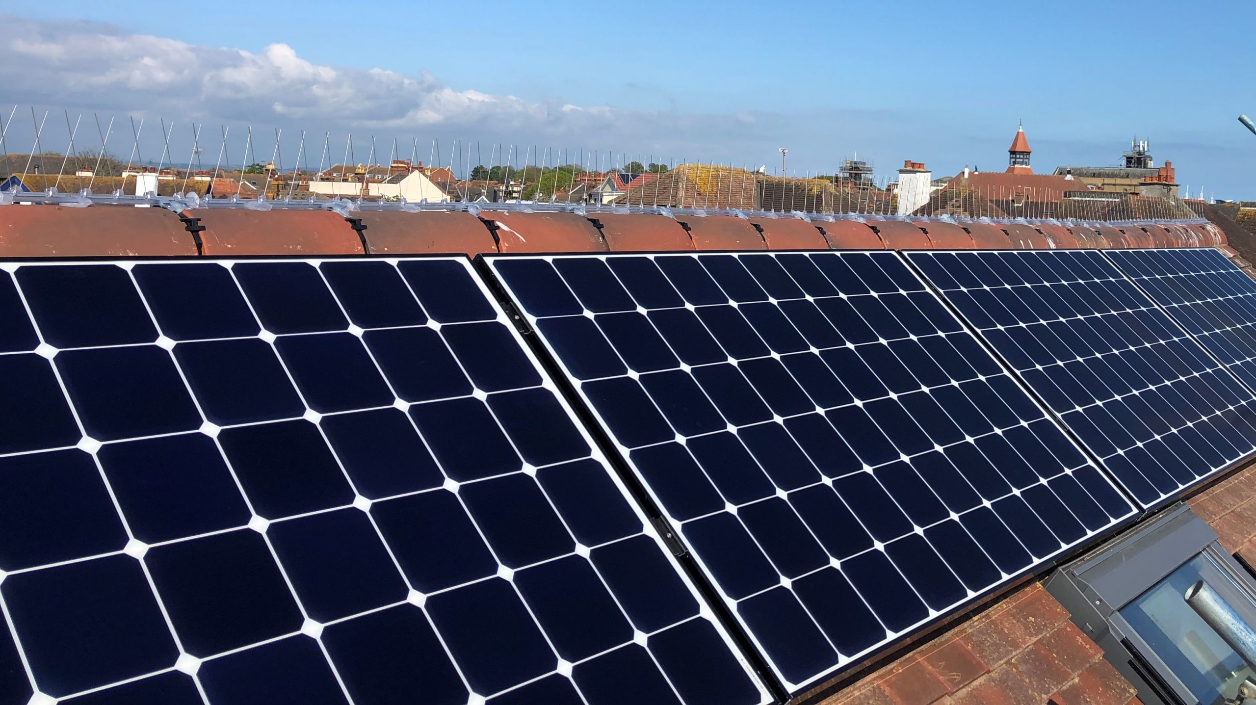 Solar panels installed by Wagner Renewables installed on a tiled roof.